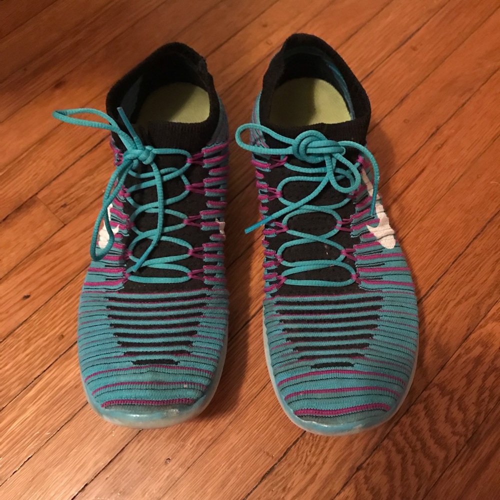 Blue and purple Nike fly knit shoes